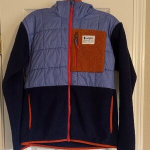 Cotopaxi women’s Puffer Jacket with polar fleece arms and waist